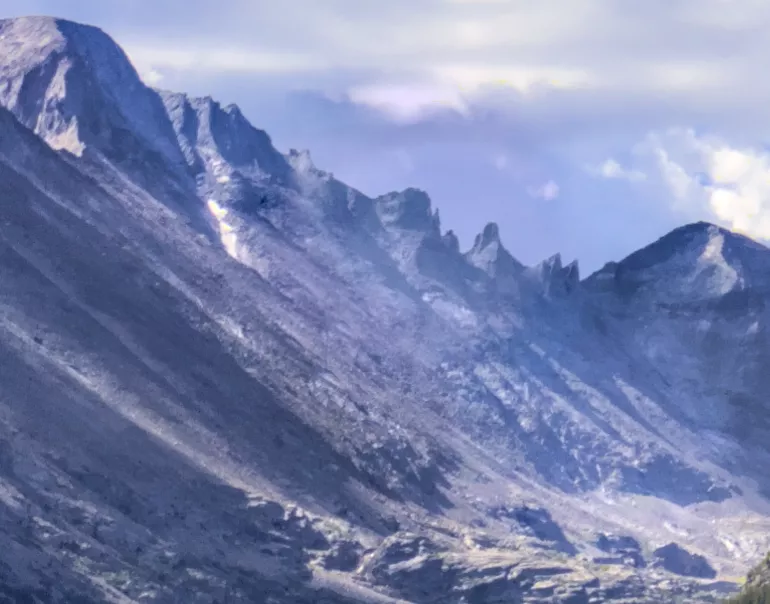 Mountain with lens flare before adding different colors to the shadows and highlights using color balance rgb