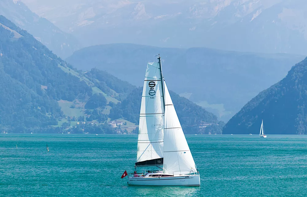 final version of the telephoto shot of a boat on a large lake
