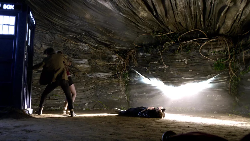 Rory is erased from existence as he is touched by the light from the crack in the universe
